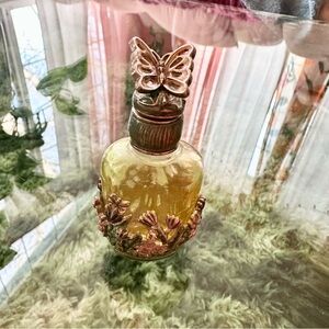 Small vintage butterfly perfume bottle